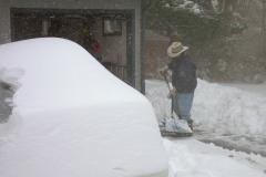 Kathy shoveling snow