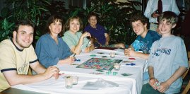 family members playing Sequence