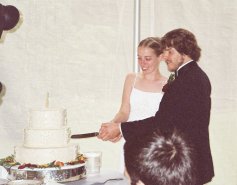 Jocelyn and Steve cut the cake together.