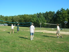 Steve, Kevin, Phil, and Scott play badminton.