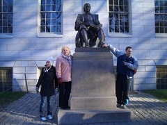 Lidia at the statue of John Harvard in Harvard Yard