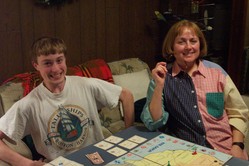 Phil and Kathy posing at the game table