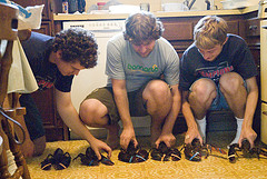 guys lining up lobsters on the floor