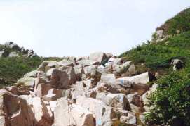 trail ascending full of large rocks