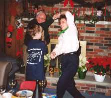 Phil, Grandpa, and Nancy dance holding hands