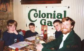 Phil, John, Mark, and Scott at the restaurant table
