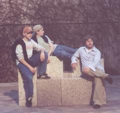 John, Phil, and Steve taking it easy on a stone block sculpture