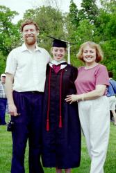 Dad, Jocelyn, and Mom pose.