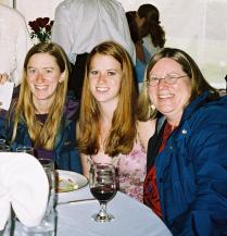 Elizabeth, Martha, and their mother Amy at table