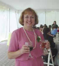 Kathy with wine and tea