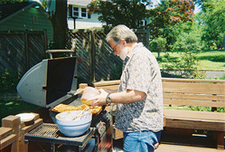 on the porch with the gas grill