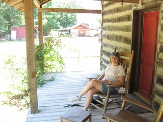 Kathy in chair on porch