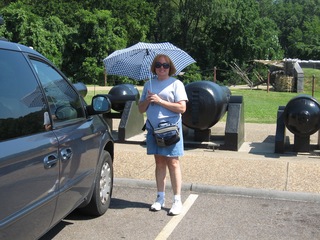 Kathy with umbrella and cannons